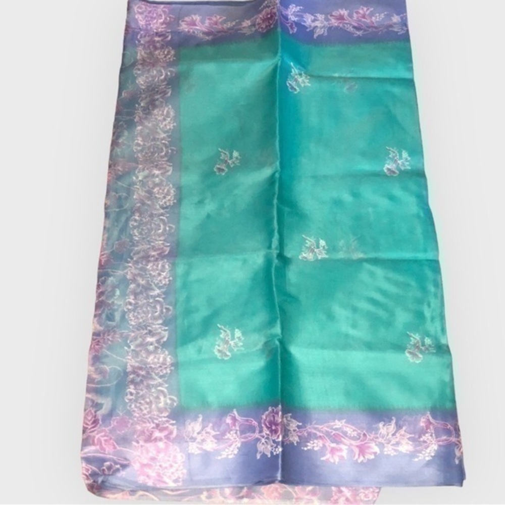 Mint Green And Lavender Colored Floral Netted Saree
